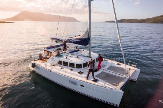 The sail catamaran out on sea