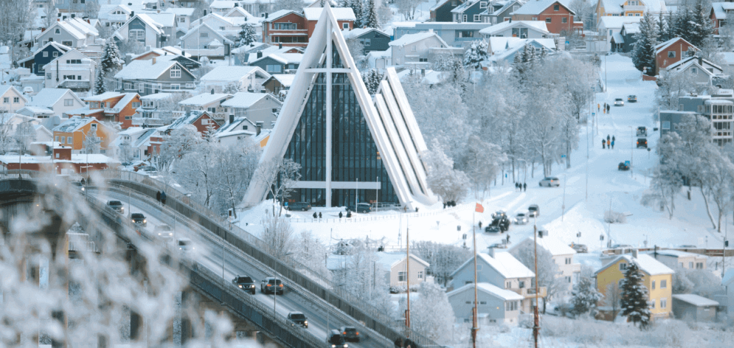 Tromsø bridge in winter with the Arctic Cathedral in the background