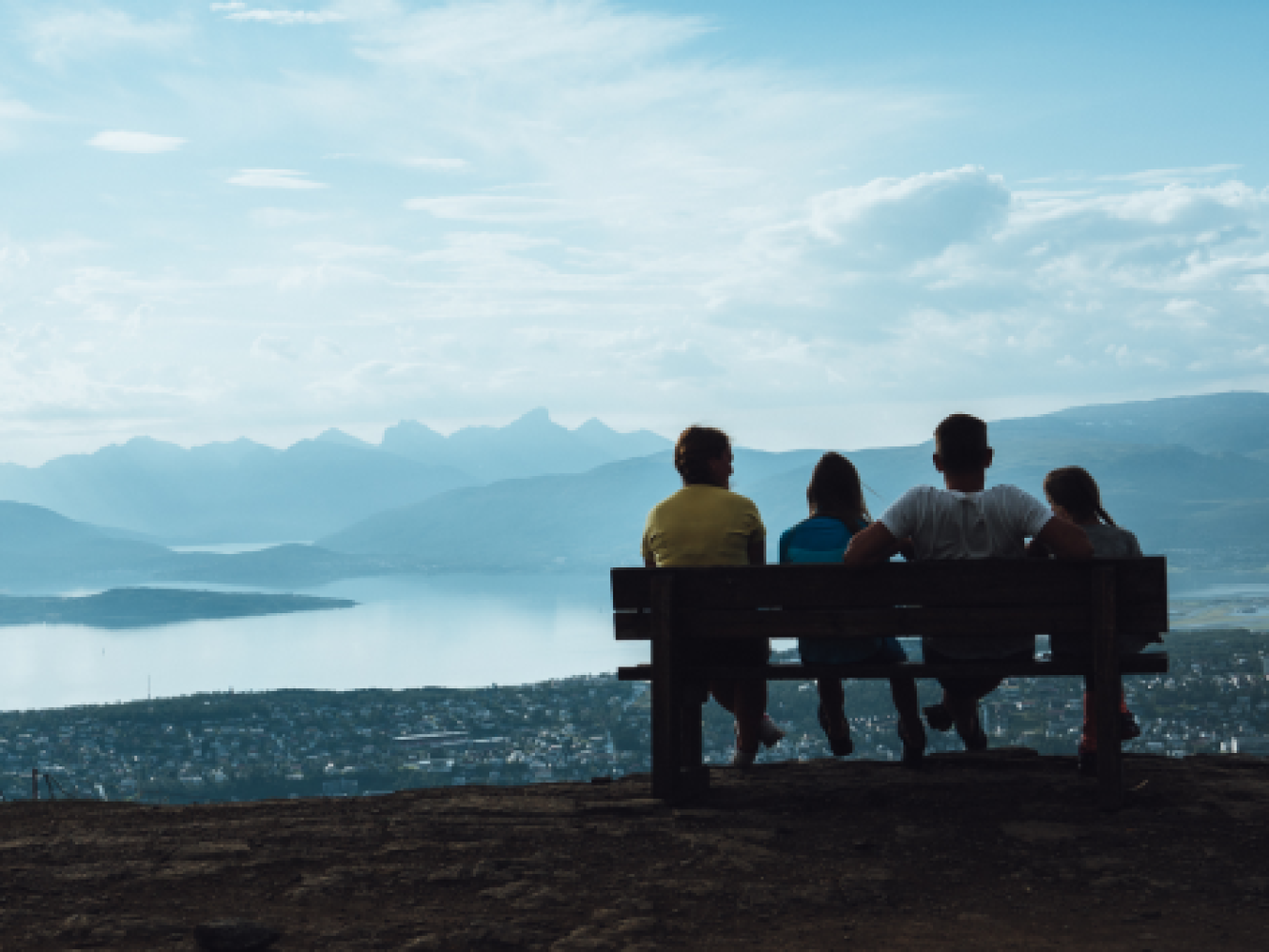 Family enjoying the view of Tromsø and Kvaløya